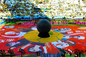 SAO PAULO, BRAZIL - JUNE 12:  Happiness Flag during the Opening Ceremony of the 2014 FIFA World Cup Brazil prior to the Group A match between Brazil and Croatia at Arena de Sao Paulo on June 12, 2014 in Sao Paulo, Brazil.  (Photo by Elsa/Getty Images)
